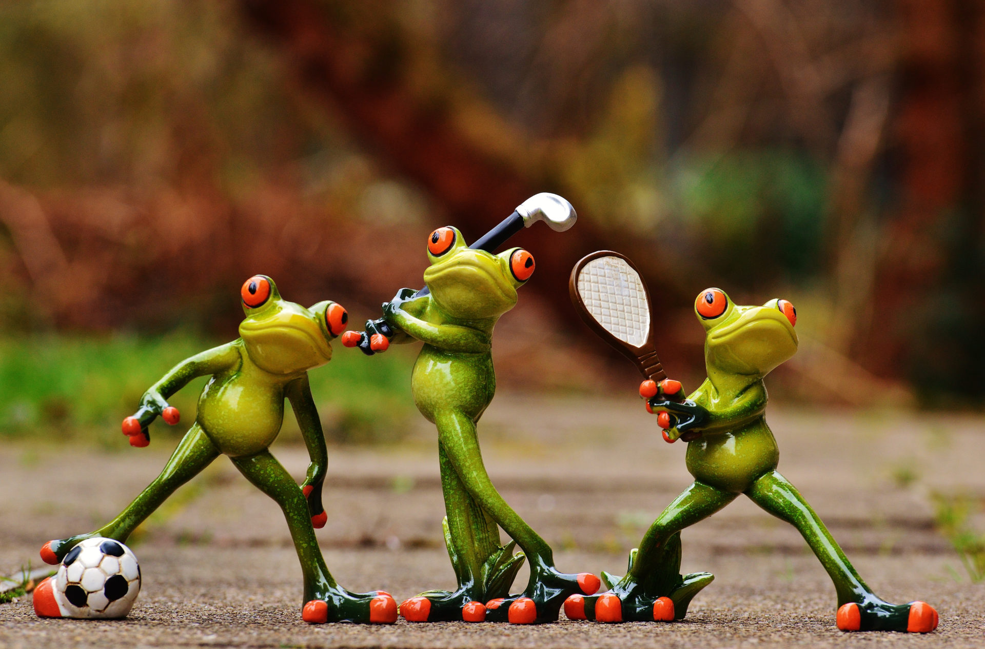 Frog figures playing sport