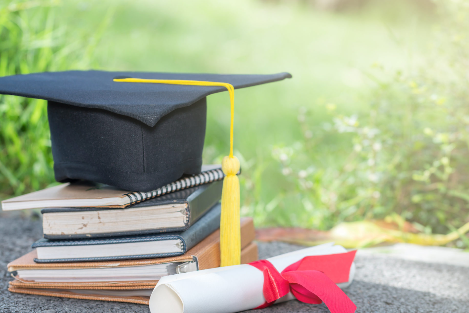 Student books and graduation cap