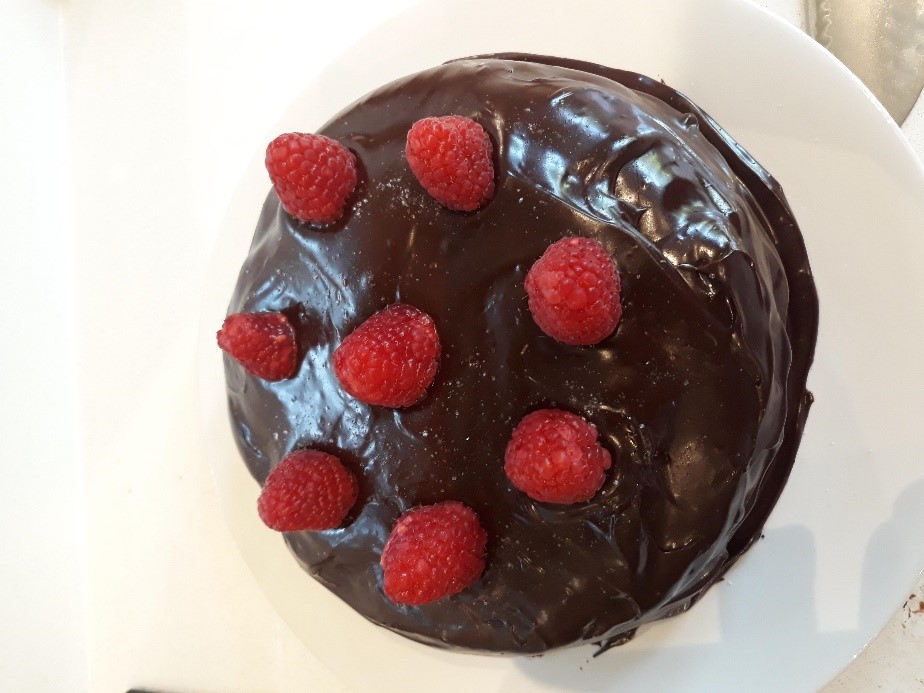 A close up of a piece of cake on a plate.